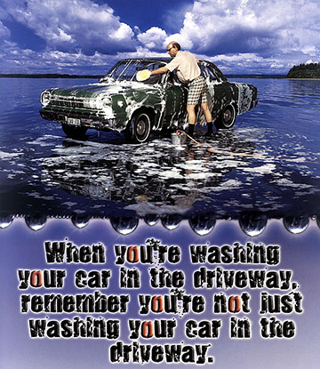 Man Washing Car In Ocean